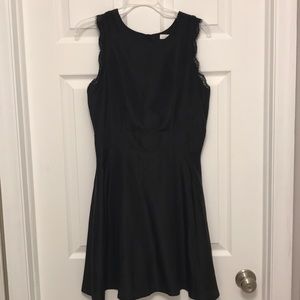 Black cocktail dress with open back